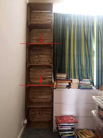 A narrow bookcase from fruit crates