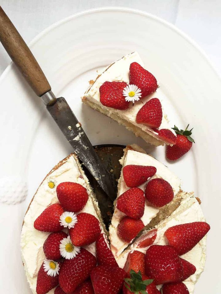 Simple strawberry layer cake with whipped cream