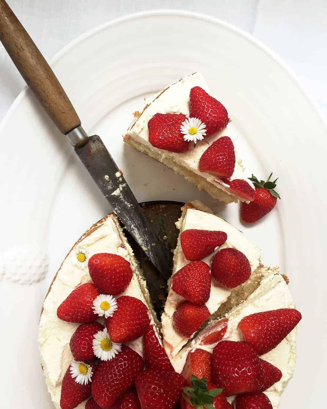 Simple strawberry layer cake with whipped cream