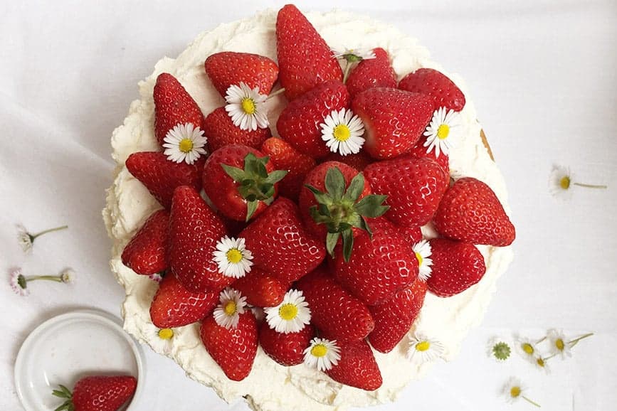 A Cake with Strawberries at the top