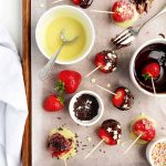 Summer dessert - fresh strawberries dipped in milk chocolate