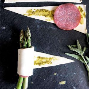 wrapping asparagus in puff pastry