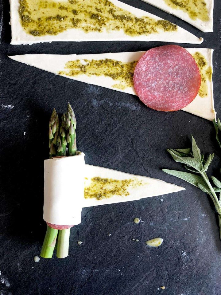 wrapping asparagus in puff pastry