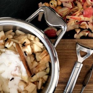 Apples in the pot with cinnamon and sugar