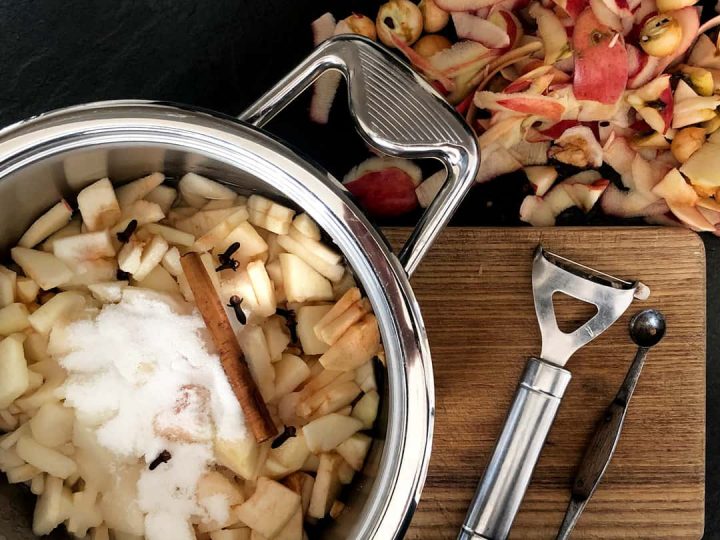 Apples in the pot with cinnamon and sugar