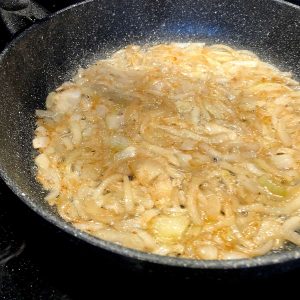 lightly golden onion in the pan