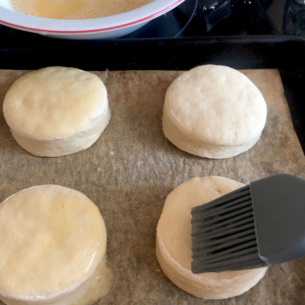 Giving scones egg-wash.