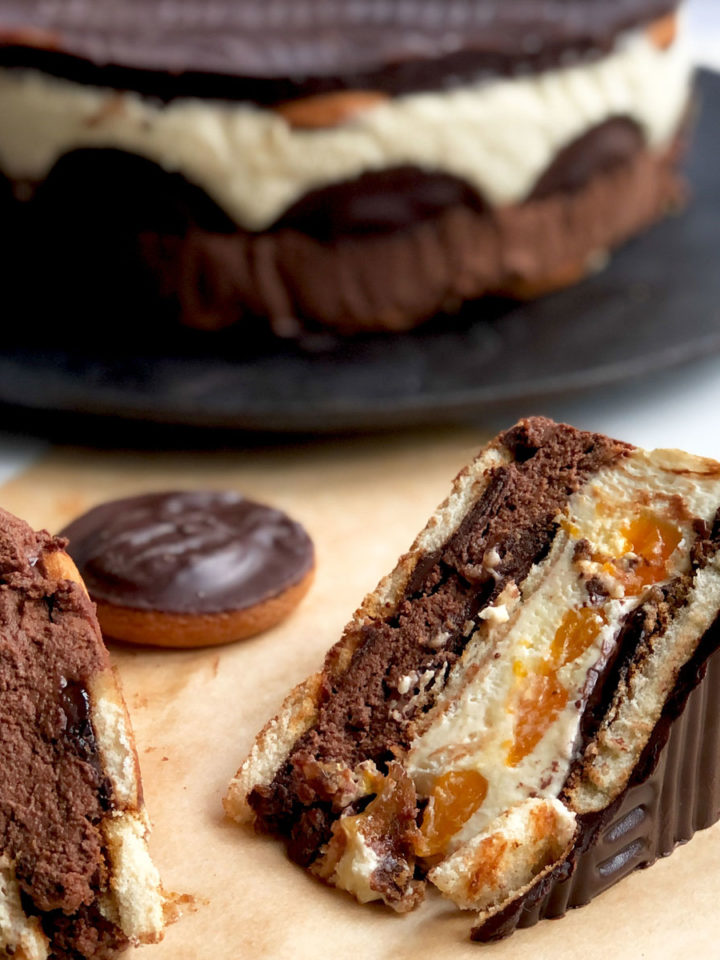 A slice of no-bake cake with the cake at the background.