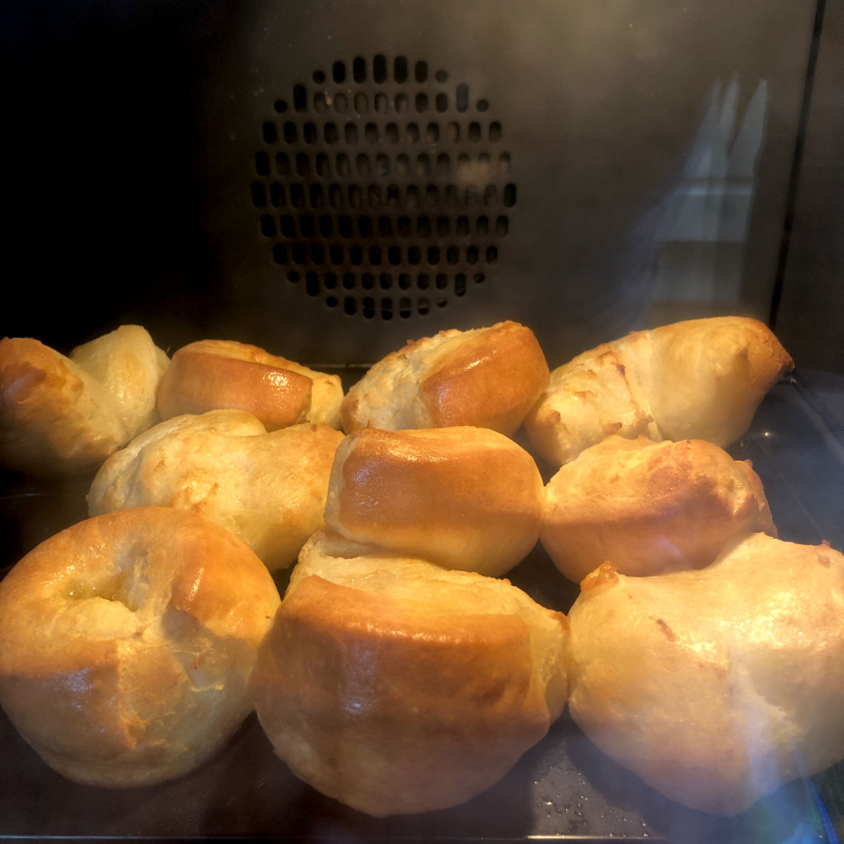 Rising Yorkshire puddings inside the oven at 180C..