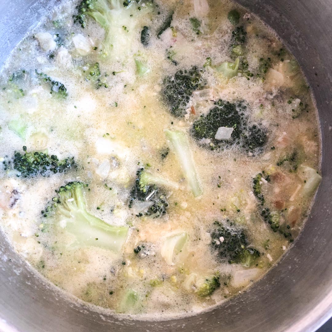 Broccoli soup with melted blue cheese.