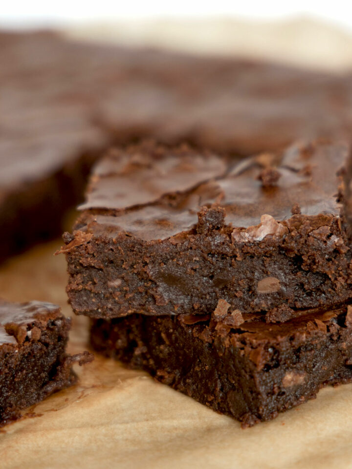 Two slabs of moist chocolate brownies.