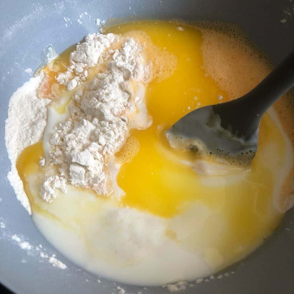 Ingredients for fluffy pancakes in a bowl.